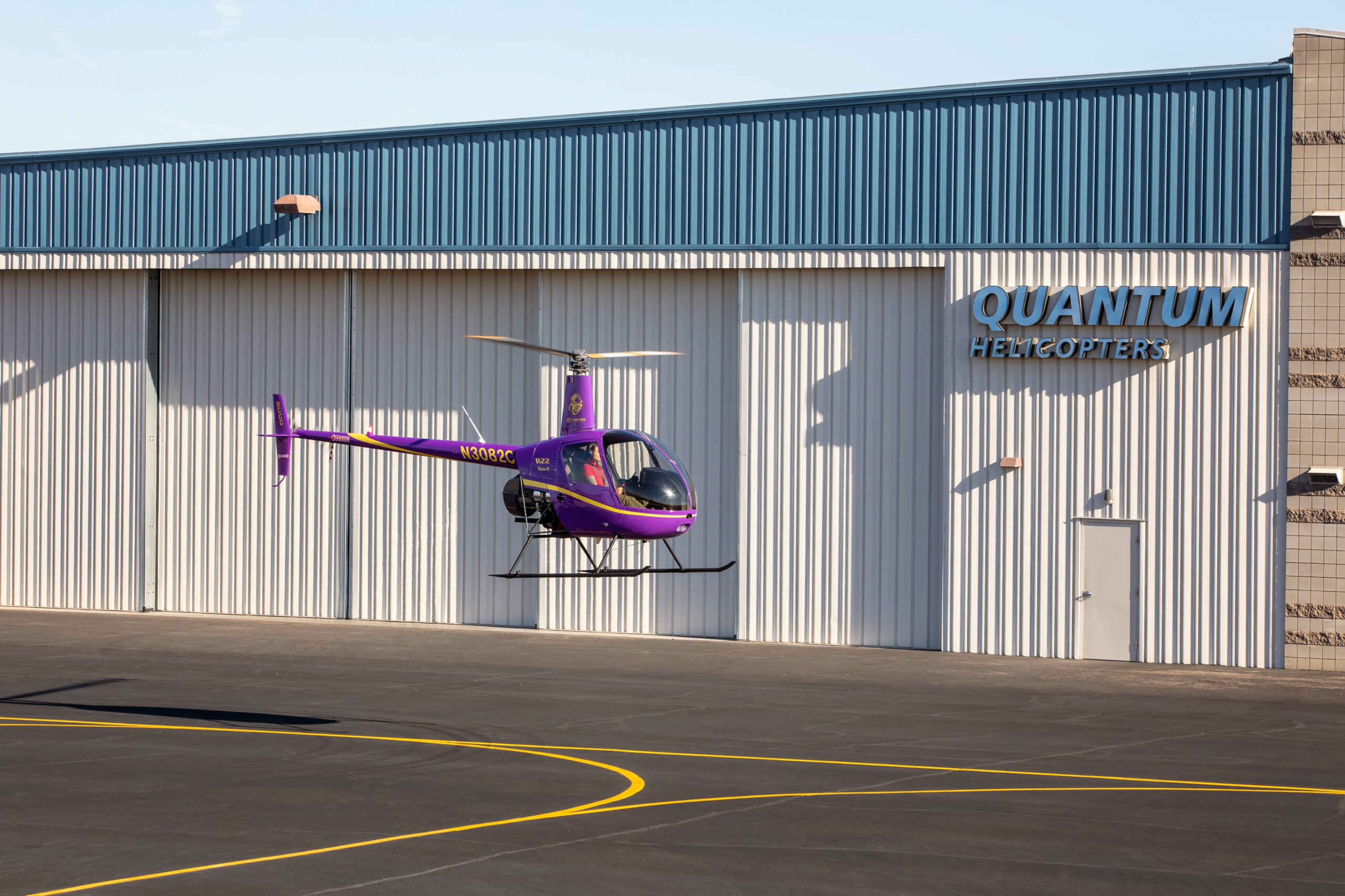 Purple Helicopter in front of Quantum Building