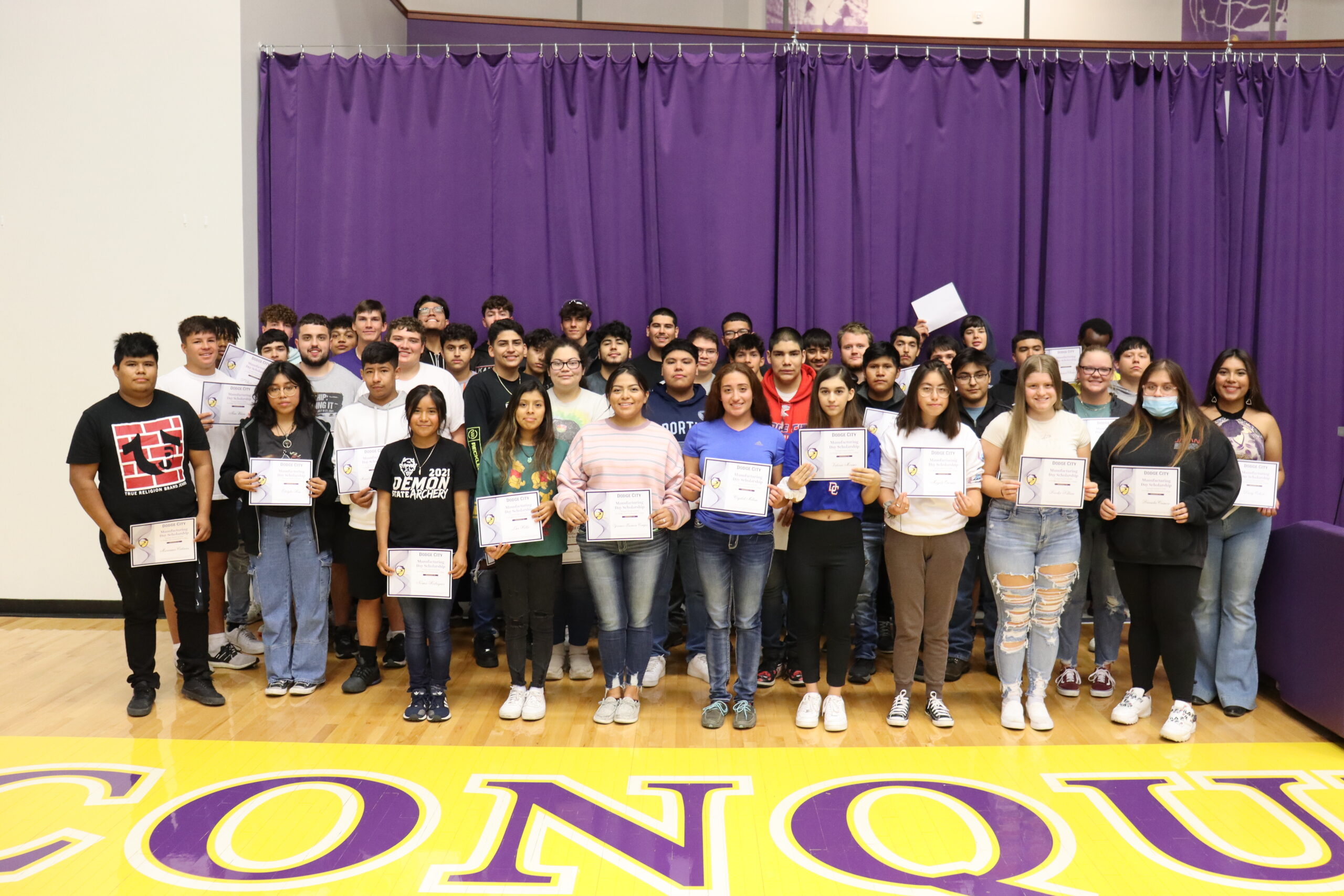 A group of 139 Dodge City High School (DCHS) students attended the Manufacturing Day luncheon at the Dodge City Community College (DC3) Student Activity Center on Friday, Oct. 1. In addition to hearing remarks from DC3 President, Dr. Harold Nolte; Kitchens Inc. CEO, Scott Bogner and Kansas Manufacturing Solutions Vice President of Partnership Operations, Danica Rome; 55 of the students, all DCHS seniors, were presented with $500 scholarships to DC3. Before and after the luncheon, the students toured Broce Manufacturing Co. Inc., Curtis Machine Co. Inc., Roto-Mix LLC and Ellis James Inc. Fabrication. [Photo by Luke Fay]